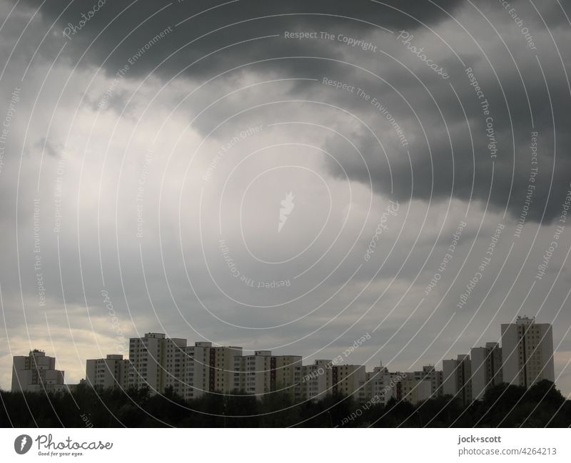 Ups and downs in real estate and the gloomy climate shows slight brightenings Sky Bad weather Tower block Moody Gloomy Subdued colour Silhouette Architecture