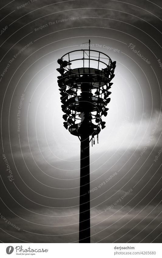 A light pole with many small lamps, in the dark evening sky. Pole Sky Deserted Exterior shot Day B/W Black & white photo Clouds Analog Environment Lamp