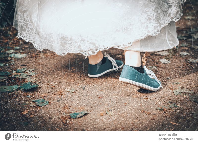 Wedding dress with sneakers Exterior shot Romance Detail Wedding anniversary Love Photo shoot Interest Optimism Joie de vivre (Vitality) Rebellious Positive