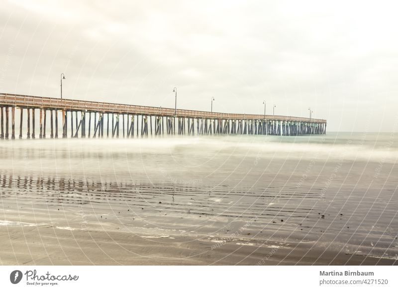 The Cyucos Pier at the Cayucos State Beach, California cayucos state beach bridge sea empty pier california travel copy space tourism dream piers landscape