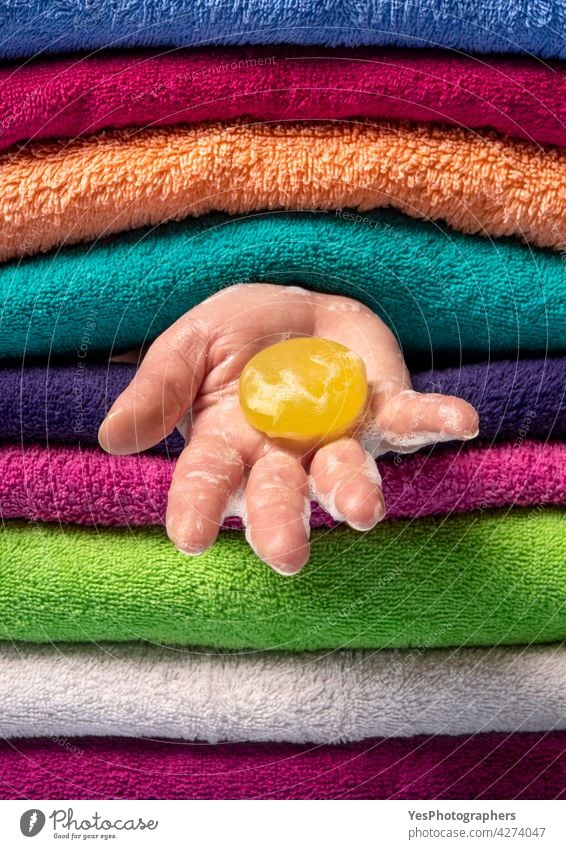 Personal hygiene concept. Washing hands with natural soap. background bar bath bathroom blue care clean close-up color copy space fabric fluffy folded