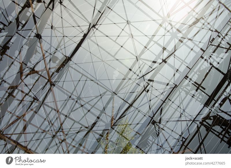 Double roof of a hangar Structures and shapes Roof Construction Architecture Detail Abstract Sunlight Back-light metal carrier wooden slats Manmade structures