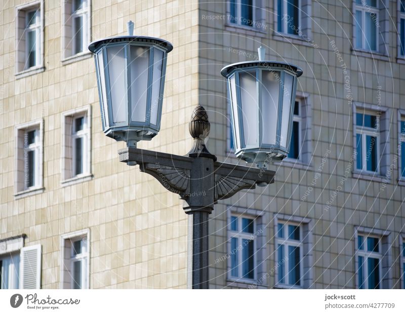 Paulick candelabra in front of socialist classicist facade Street lighting Lantern Karl-Marx-Allee Nostalgia Style Architecture GDR Past Historic Facade