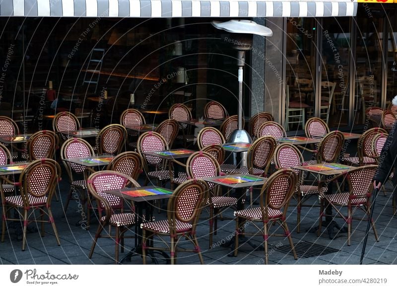 Outdoor catering with tables and chairs of a café in the early morning at the Konstablerwache in Frankfurt am Main in Hesse Café Bistro Restaurant Gastronomy