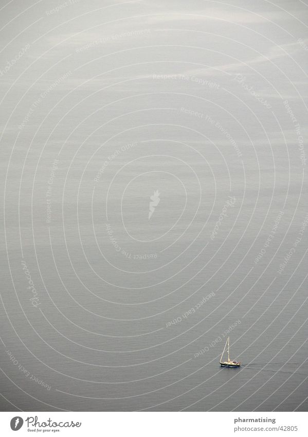 Lonely grey Ocean Gray Loneliness Sailing ship Horizon Far-off places Navigable water Clouds Waves Sky Vacation & Travel sea lonely sailboat wide vast journey