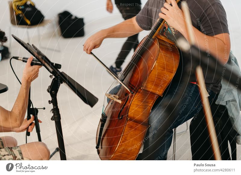 Man playing cello Playing Music Musician Musical instrument Cello String instrument Musical instrument string Make music Detail Art Orchestra Interior shot