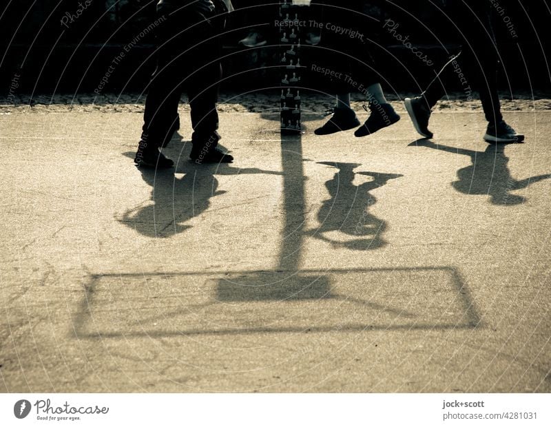 upside down | jump shot in basketball Basketball arena Leisure and hobbies Asphalt Shadow play Sunlight wall park Prenzlauer Berg Throw Silhouette Movement