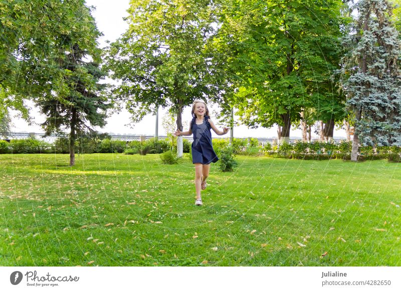 Caucasian girl running in summer with tousled hair Girl Child preschool child Disheveled Hair Walking Schoolgirls youthful Woman Lady Blonde White Infancy