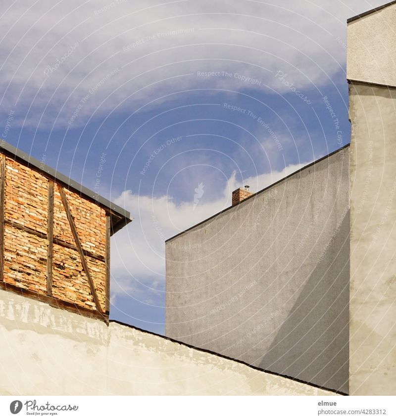 View of various windowless house walls in sunshine and fair weather clouds / lines / residential architecture apartment buildings Wall (building)