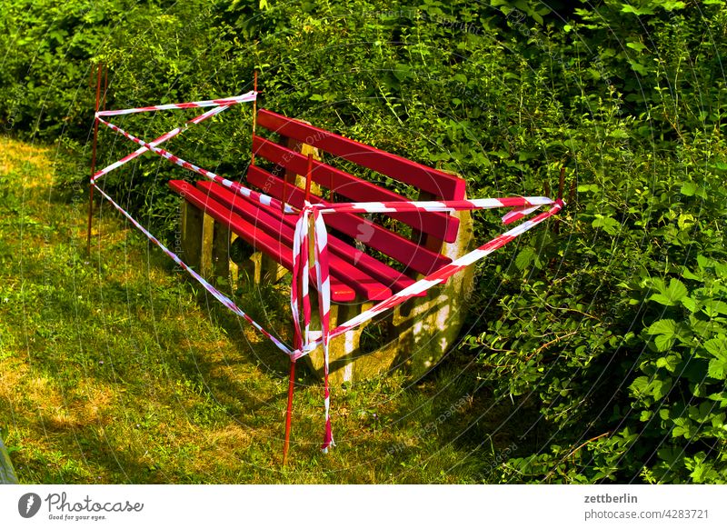 restricted bank haggard Bench flutterband Fresh freshly painted Barred Canceled New Park Park bench lock city park interdiction Crime scene Fence Fenced in