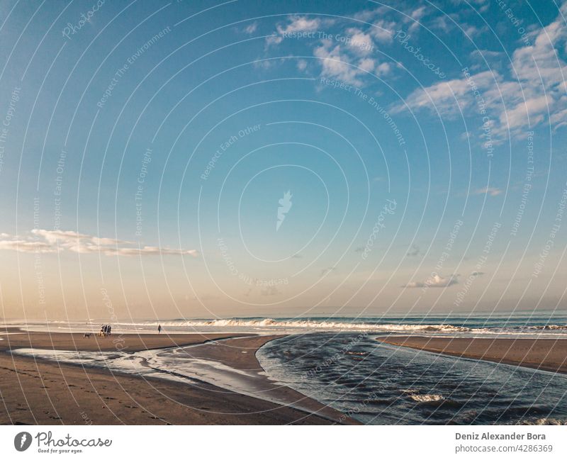 Early morning sunrise at the beach in Bali Denpasar Seminyak seminyak sandy sea wave ocean coast dream sparkle looped gold holiday maker deck wet coastline