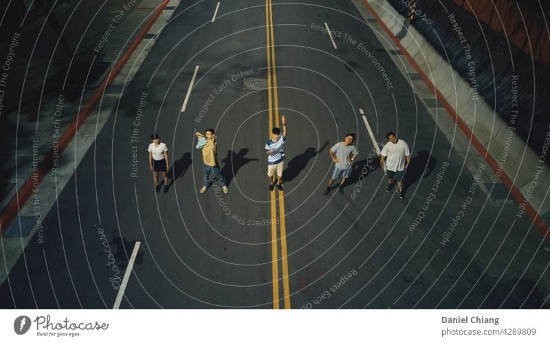 Friendship In The Middle Of The Street friend people road Night Night life friends Colour photo happy fun Exterior shot friendship lifestyle young happiness