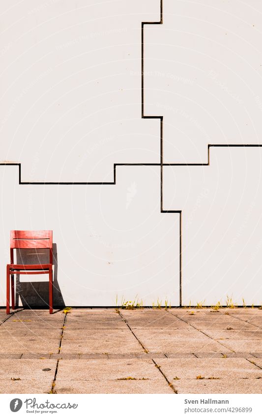 red chair in front of a wall Minimalismus Waterfront abstrakt rot stuhl urban uster wand weiß Red Seating Chair Empty chairs out Summer Furniture Deserted