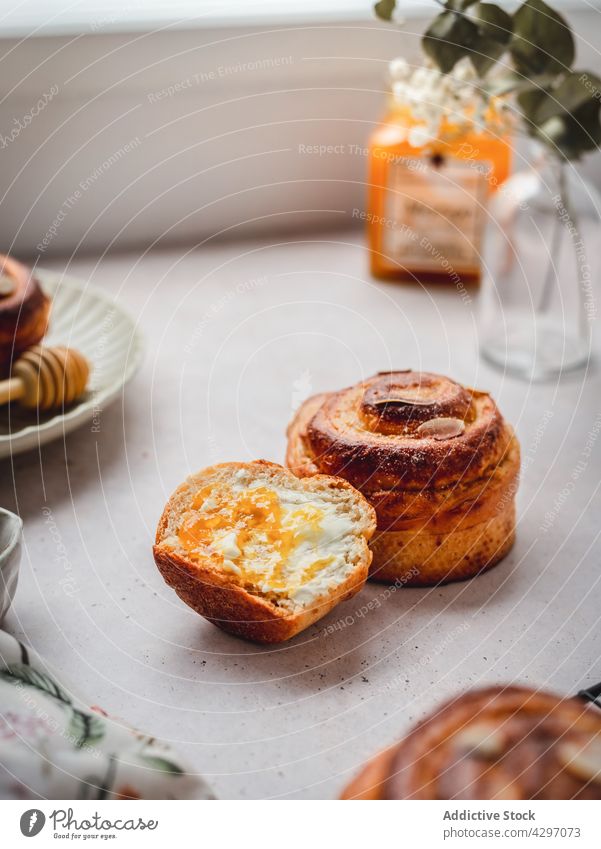 Fresh cinnamon buns on table morning fresh dessert food delicious half whole breakfast homemade organic yummy natural sweet meal appetizing tasty pastry