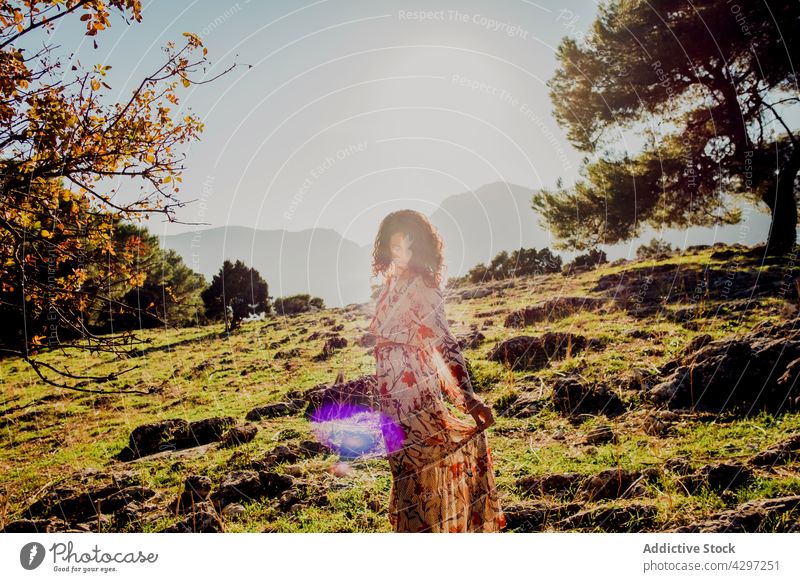 Tender woman in dress in mountains carefree summer tender serene highland grace freedom female hill rocky nature outstretch enjoy tranquil peaceful summertime