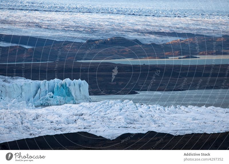 Glacier on coast of sea glacier shore winter cold ice cover weather season nature iceland snow picturesque frozen rough landscape water frost scenic ocean