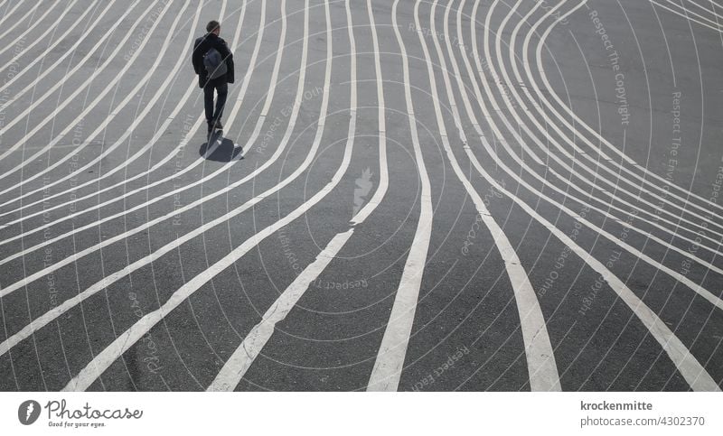 streamlined marker - man crossing Superkilen Park in Copenhagen super kilns lines structure Structures and shapes asphalting Progress Landmark Lined on track