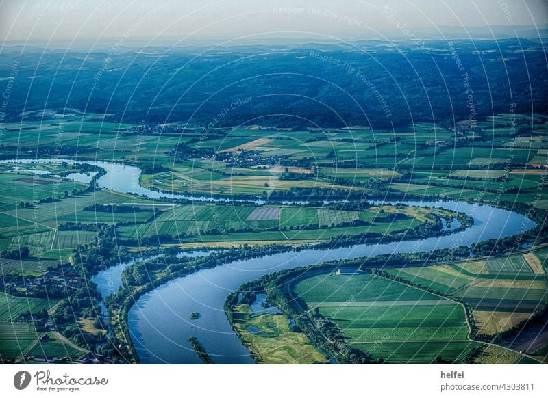 Aerial view with the river Danube meandering in the background mountains in Bavaria balloon Ballooning Flying hot-air balloon Basket Summer travel Adventure