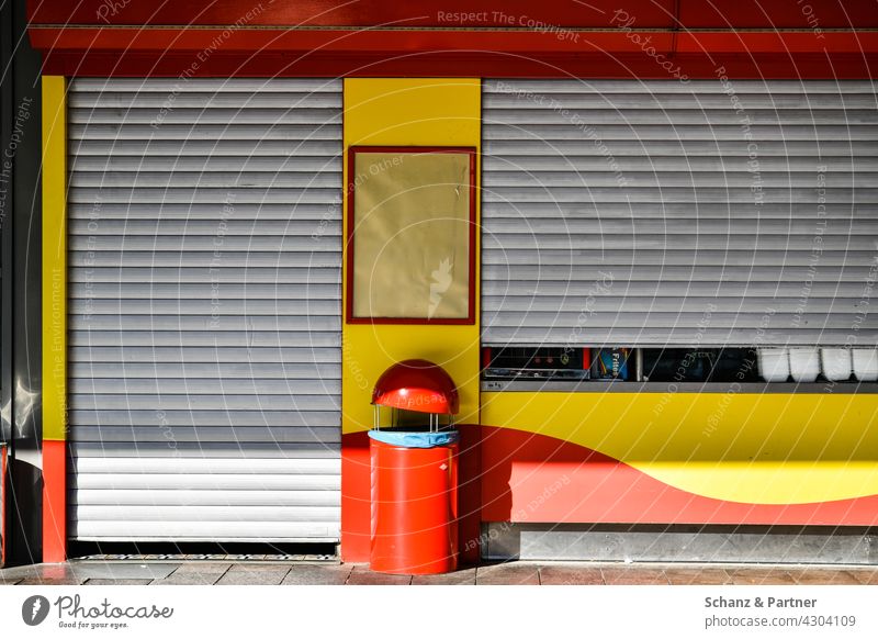 closed snack bar in red and yellow Fast food Closed Gastronomy Yellow Red roller shutter opening hours Eating booth Snack bar Nutrition Lunch French fries Fat