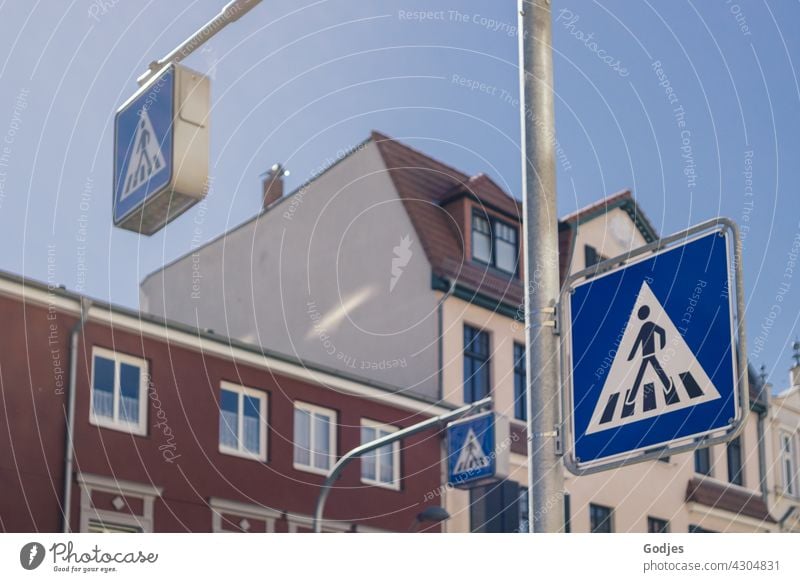 Road signs zebra crossing / pedestrian crossing with residential buildings in the background Zebra crossing Pedestrian crossing Street Traffic infrastructure