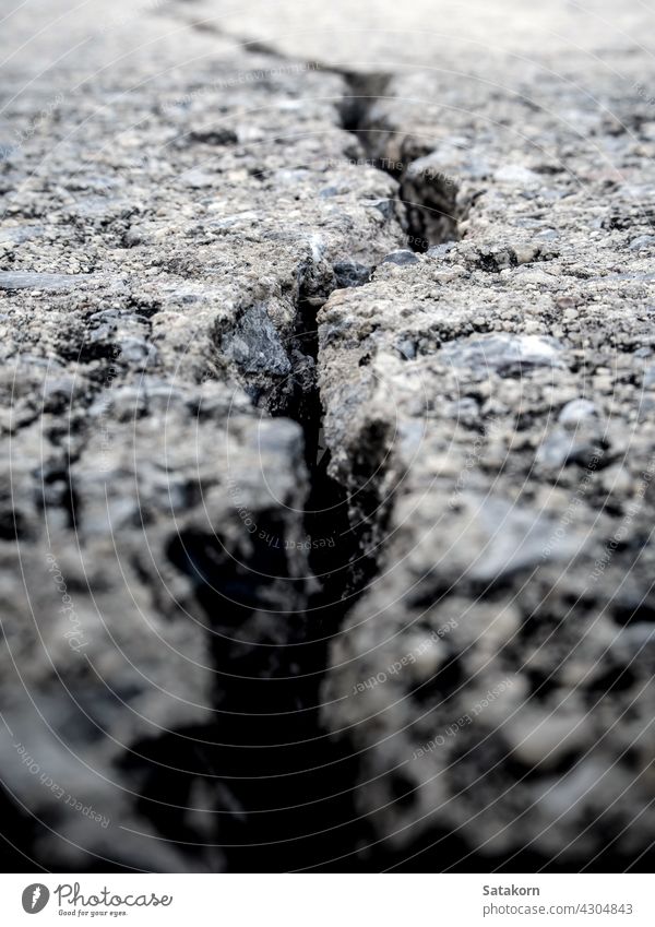 Cracked and separated of concrete floor aged ancient architecture break building cement construction crack detail dirty grey ground hard house material old