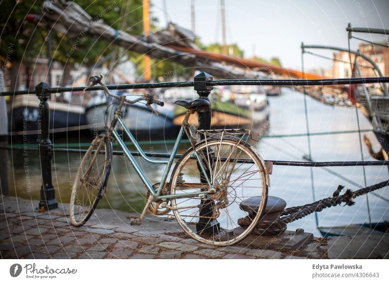 Bicycle in Dutch streets traditional old-fashioned bike bicycle cycling city Culture Europe Heritage Historic Holland Netherlands Outdoor Picturesque