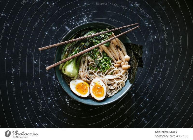 Bowl with yummy fresh ramen bowl dish tradition lunch chopstick tablecloth asian food cuisine delicious meal tasty gourmet japanese oriental dinner nutrition