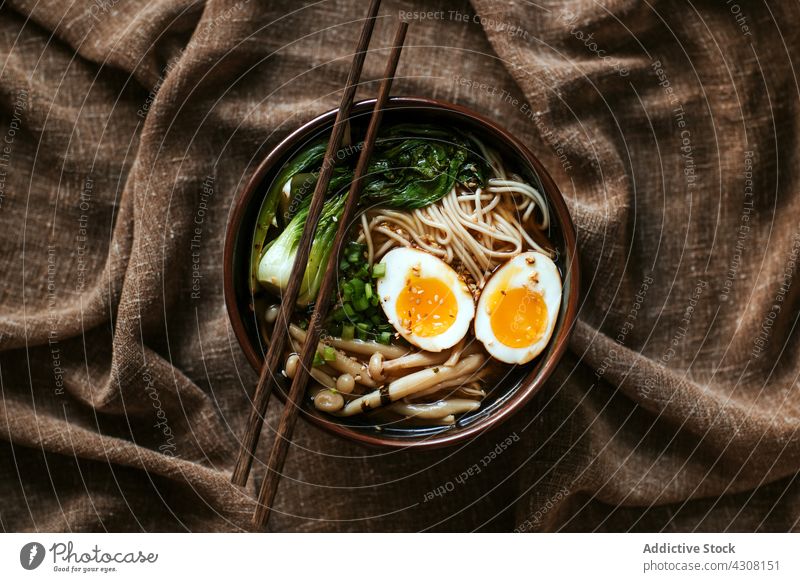 Bowl with yummy fresh ramen bowl dish tradition lunch chopstick tablecloth asian food cuisine delicious meal tasty gourmet japanese oriental dinner nutrition