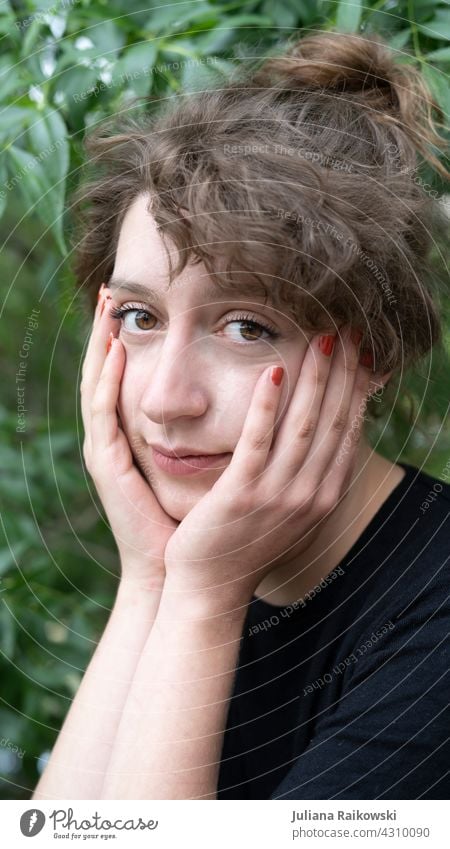 young woman looks thoughtfully into the camera Woman Meditative portrait Face Human being Feminine Adults Young woman Youth (Young adults) 1 18 - 30 years