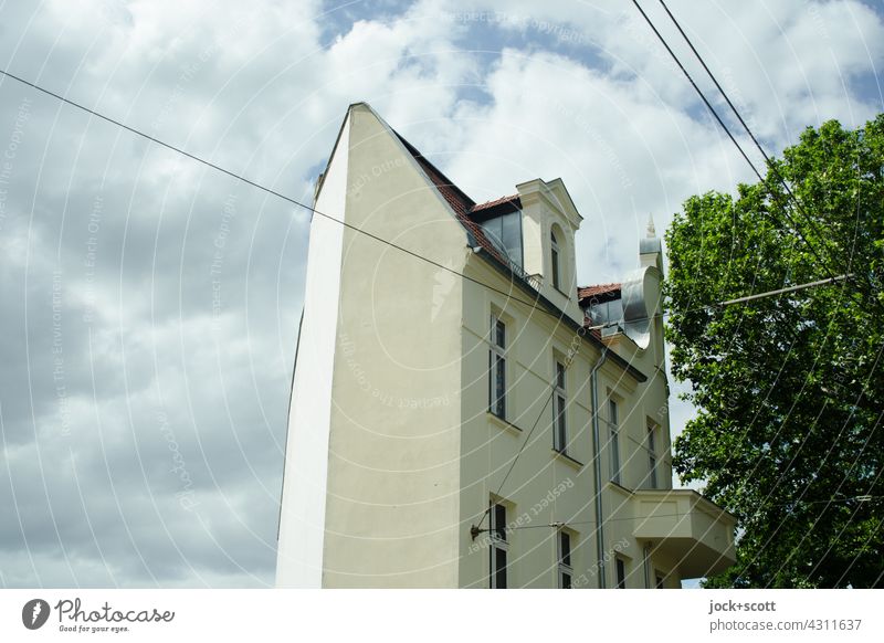 Sky + clouds behind the townhouse House (Residential Structure) Fire wall Architecture köpenick Berlin Facade Structures and shapes Clouds Deciduous tree