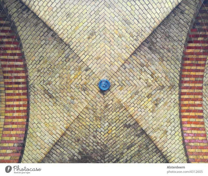 Brick ceiling in a colonnade portico in the center merged into a blue seal Colonnade Column Blanket Pattern Colonnades Hamburg Public accessible Middle blue