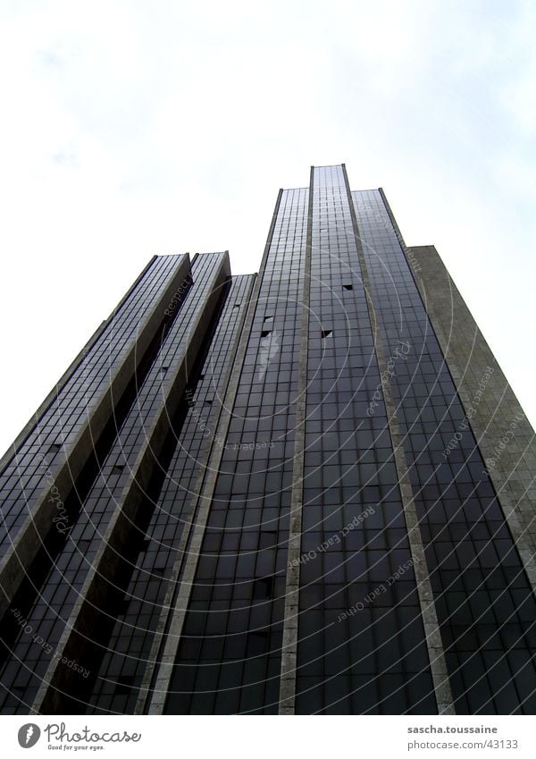 It's hard to believe: A skyscraper ;) High-rise House (Residential Structure) Building Corner Window Facade Clouds Lake Blomen Gray Black White Architecture