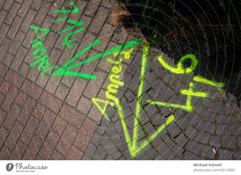 Signage at a construction site: removal of traffic lights Lettering label Exterior shot Road traffic Sidewalk Traffic lights figures mark Markings Arrow