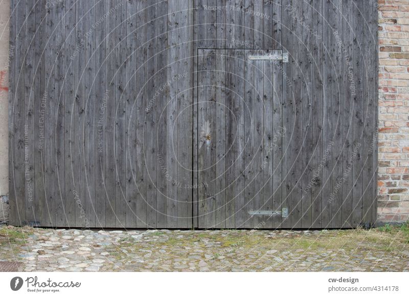 Gate entrance with door made of wood at a barn in Kremmen Goal Wooden door Wooden gate Highway ramp (entrance) Highway ramp (exit) Old Rustic