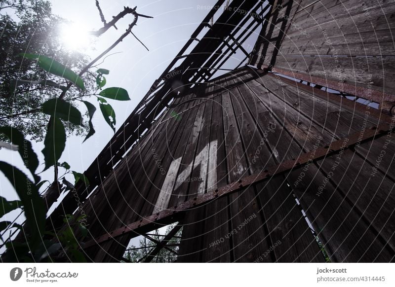 Lost Land Love | loose portal with cyrillic characters against the sun Hangar Derelict Wooden gate lost places Architecture Building Hall Ruin Ravages of time