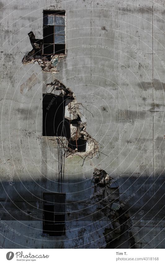 Three Broken Windows in a Broken Industrial Facade Industry Factory Brandenburg Building Industrial plant Colour photo Concrete Deserted Manmade structures