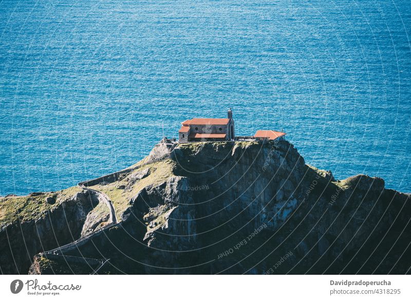 Rocky island in sea against sunset sky aerial view rock path scenery sundown destination evening breathtaking san juan de gaztelugatxe vizcaya pais vasco spain