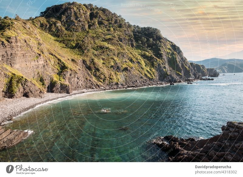 Amazing view of rocky cliff and sea island sunset seascape scenery amazing landscape san juan de gaztelugatxe vizcaya pais vasco spain sundown nature evening