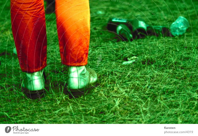 fairground Footwear Meadow Trash Green Human being Feet Orange Music festival Feasts & Celebrations