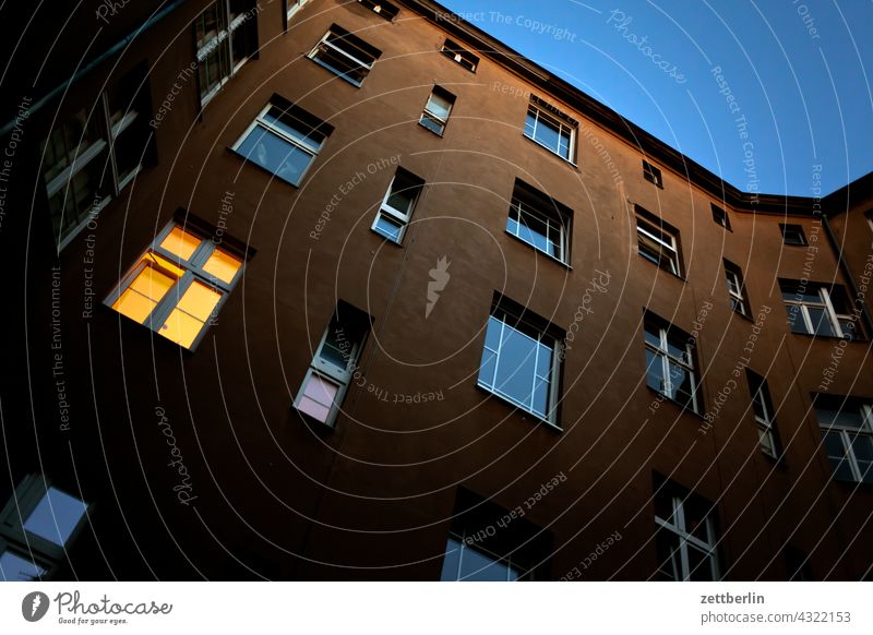 Backyard in Schöneberg again Evening Old building on the outside Fire wall Facade Closing time Window House (Residential Structure) Sky Sky blue rear building