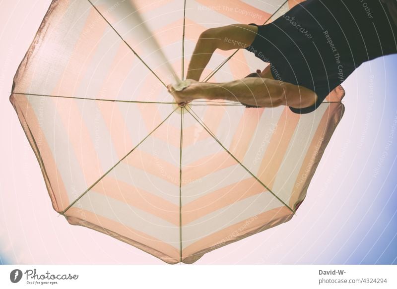 Open the parasol Sunshade stretch Summer Preparation Summer vacation Man Warmth Sunlight Relaxation