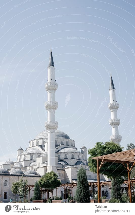 Ramadan Eid Concept background . Mosque close up view . Bishkek , Kyrgyzstan religion mosque sunset architecture travel dusk islam blue city culture tourism