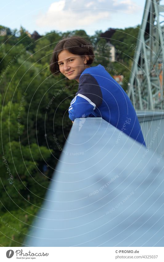 Girl on the bridge railing Youth (Young adults) teen Looking portrait Green Blue Smiling cheerful