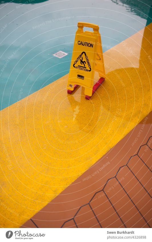 Caution sign on slippery ground Warning sign deposit Deck Cruise Rain esteem Signage Signs and labeling Clue Deserted Warning label Safety Characters Yellow