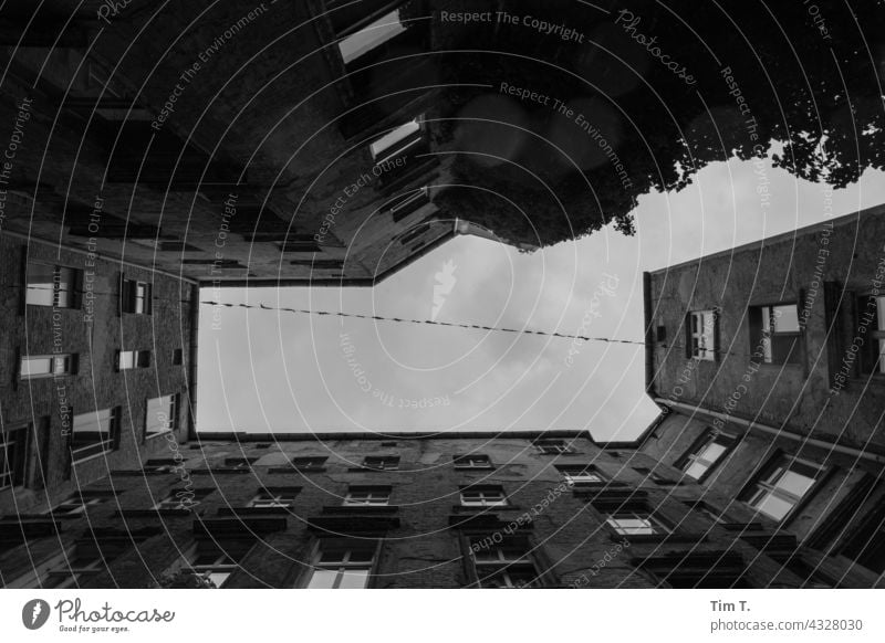 View upwards in an old backyard in Berlin b/w Exterior shot Architecture Prenzlauer Berg Backyard Courtyard Day Deserted Town Capital city Downtown Old town