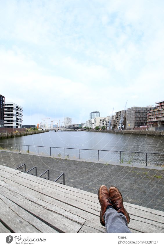 ParkTourHH21 | Between the spaces Bench Bench seat Elbe Harbor city Footwear Pants stacked Sky Break Horizon Skyline dwell High-rise Fence Water Channel Wood