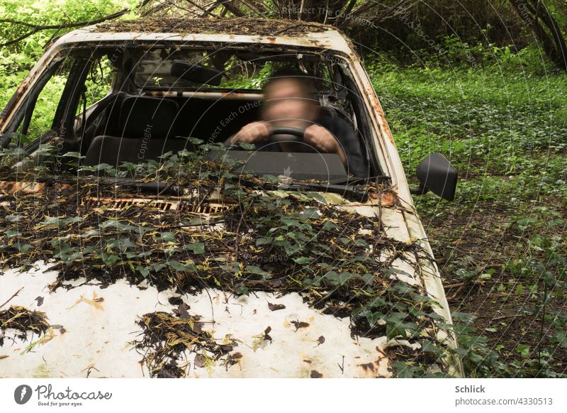 Ghost driver - selfie with motion blur in a junk car Highway drifer Phantom Scrap metal portrait White Scrapyard Scrap car Ivy Forest Steering wheel Engine hood