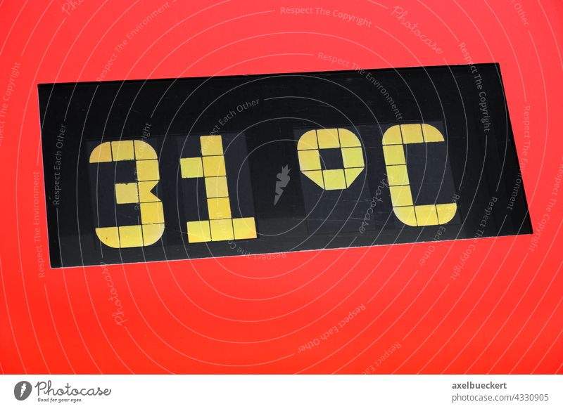 31 degree celsius on digital thermometer or temperature indicator during heat wave hot weather climate change global warming over above 30 plus thirty