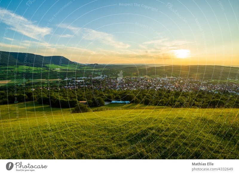 Sunset at the edge of the Swabian Alb Hill chain of hills Swabian Jura hilly Evening sun Meadow Green Nature Landscape evening mood Dusk evening light sunset