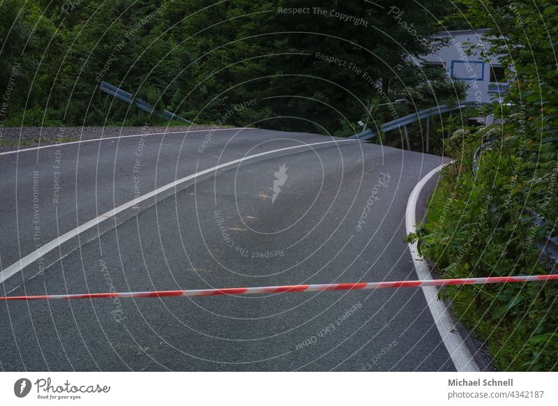 Flood-damaged road (July 2021) in Volmetal (Hagen, NRW) flood disaster Climate change cataclysm Destruction Disaster Deserted inundation Undermining Street